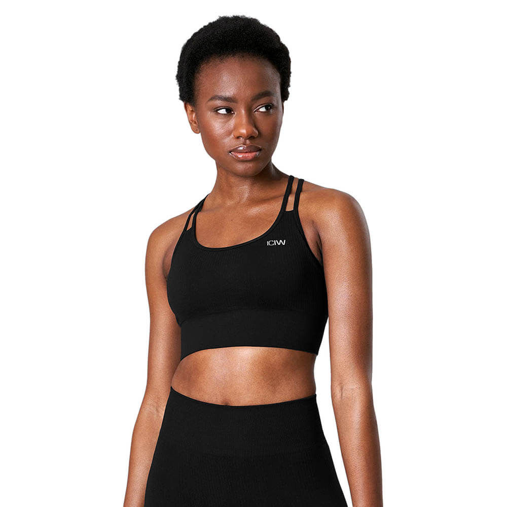 Sjekke Ribbed Define Seamless Sports Bra, black, ICANIWILL hos SportGymButikken.